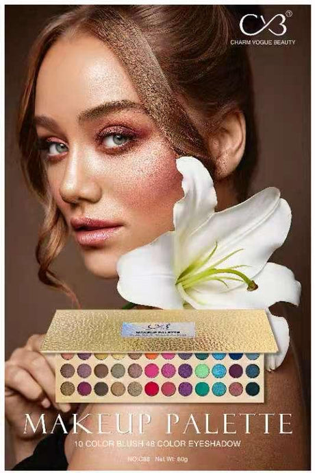 Makeup palette with a model wearing glittery makeup and a white lily.