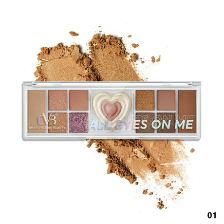 Makeup palette with 'All Eyes on Me' text and crushed powder on a white background