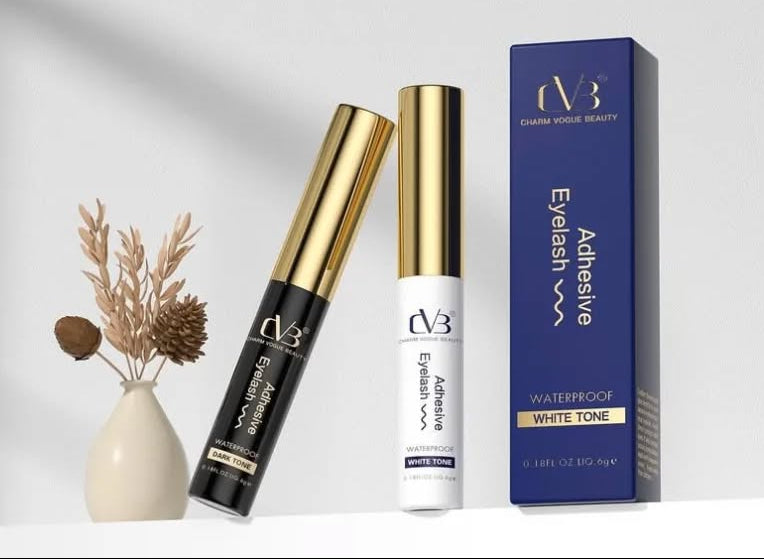 Cosmetic adhesive with applicator and packaging on a neutral background