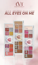 Makeup palettes with heart-shaped designs on a pink background, featuring the brand 'Charm Vogue Beauty'.