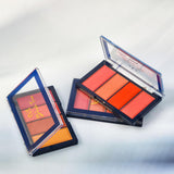 Makeup palettes with colorful shades on a light gray background