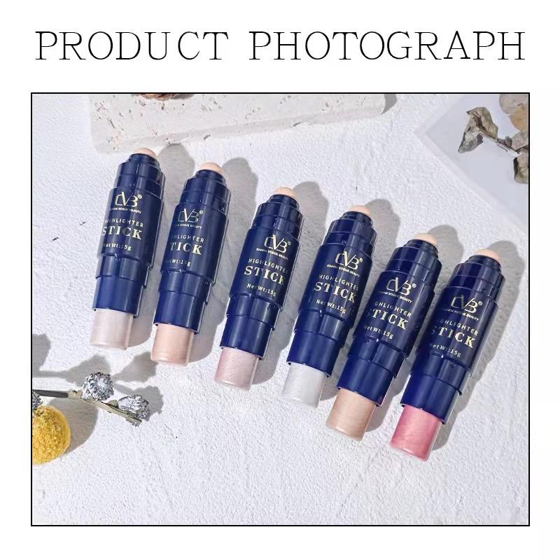 Set of cosmetic sticks with visible brand name on a textured surface