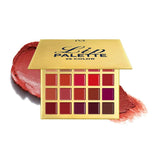Gold lip palette with 25 color swatches and a red lip balm on a white background
