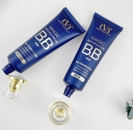 Two blue tubes of CVB Magic Skin Beautifier B.B. Foundation on a white background