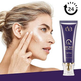 Woman applying 24K Gold Gel Primer to her face with a tube of the product displayed.