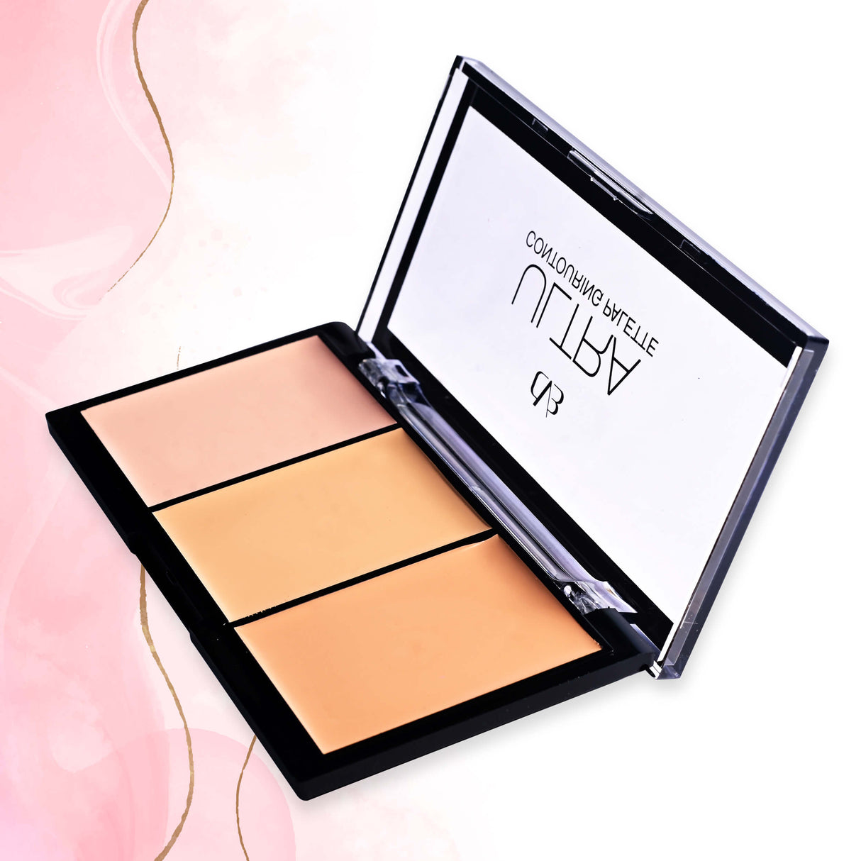 Makeup palette with three shades of beige on a pink background