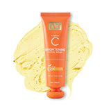 Orange facial wash tube with a yellow sponge on a white background