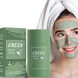 Green mask stick packaging and a woman applying green mask to her face.