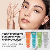 Woman applying sunscreen with a close-up of her face, and four sunscreen tubes below.