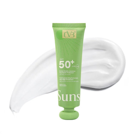 Green sunscreen tube with white cream on a white background