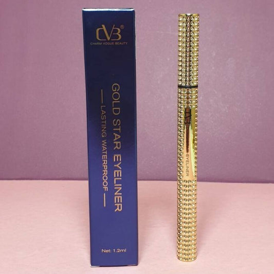 Gold star eyeliner with blue box on a pink background