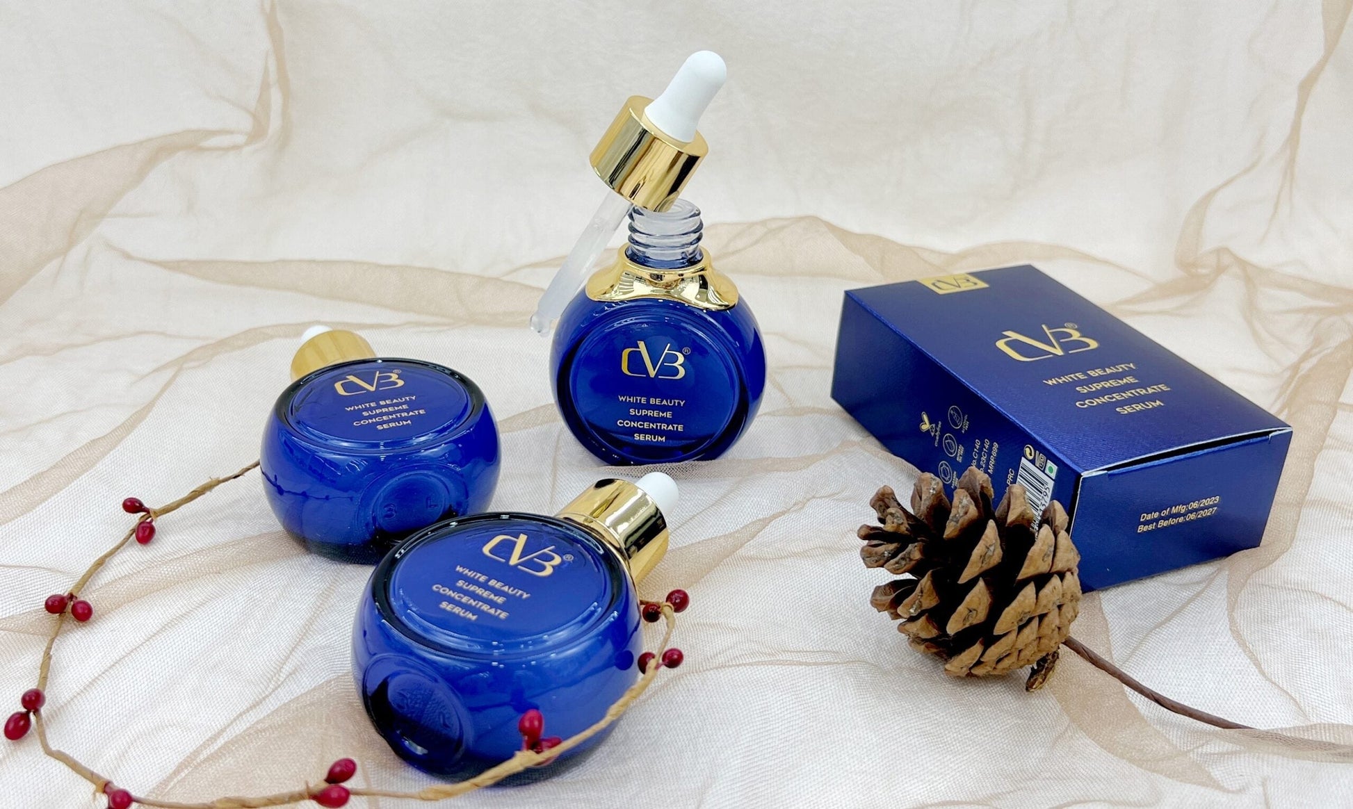 Cosmetic products with 'CVB' branding on a textured white background