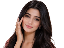 Woman with long dark hair touching her face on a white background